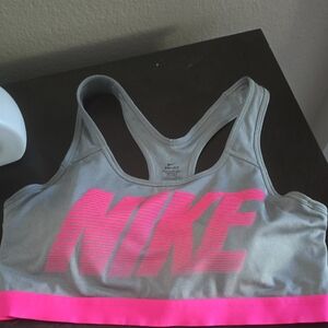 Nike DRI-FIT Sports Bra in Gray with Vibrant Pink Logo